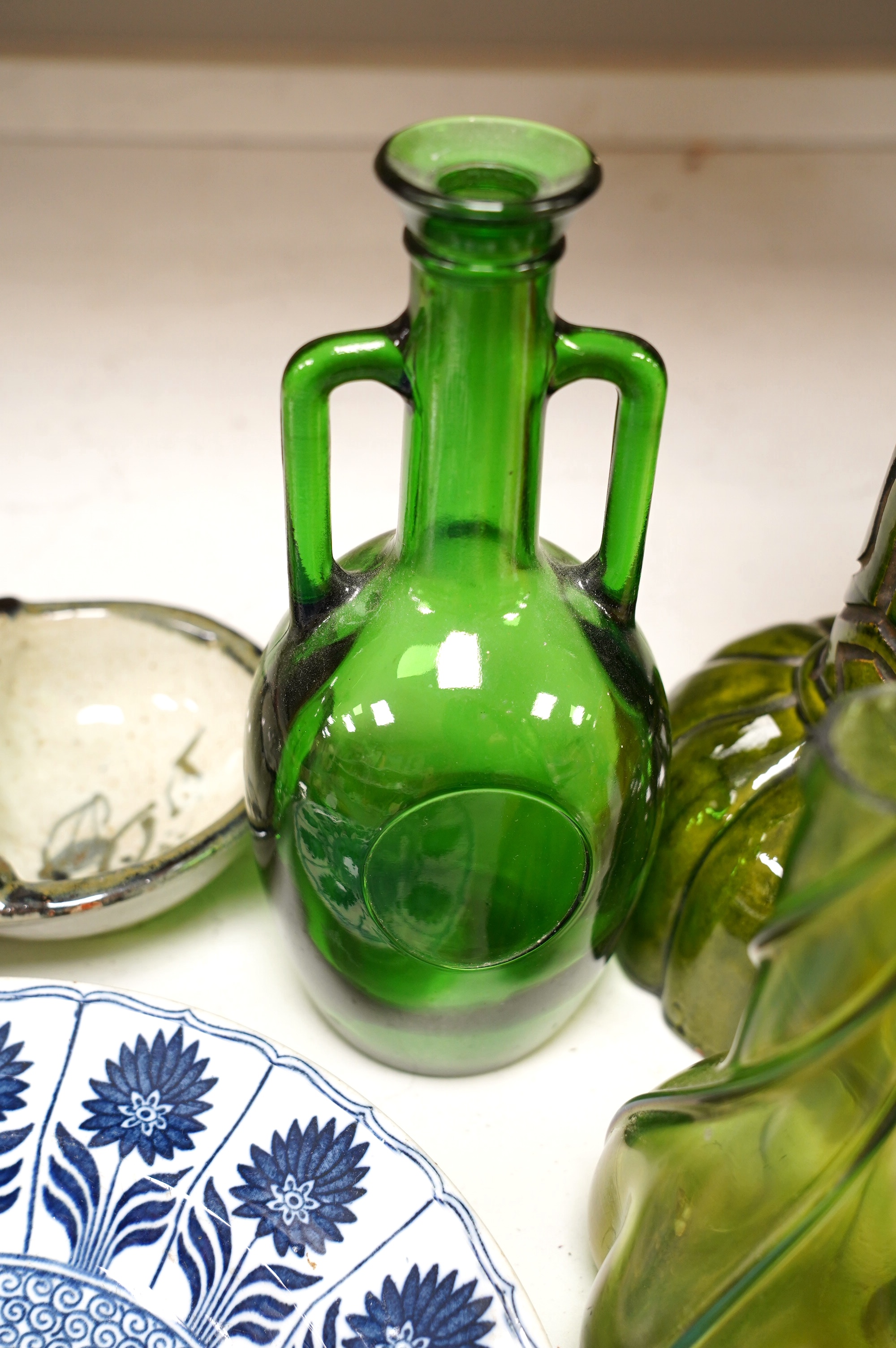 A collection of coloured glassware to include Vaseline examples and a collection of pottery to include a candlestick, a dish and a planter, largest 38cm (10). Condition - mostly fair